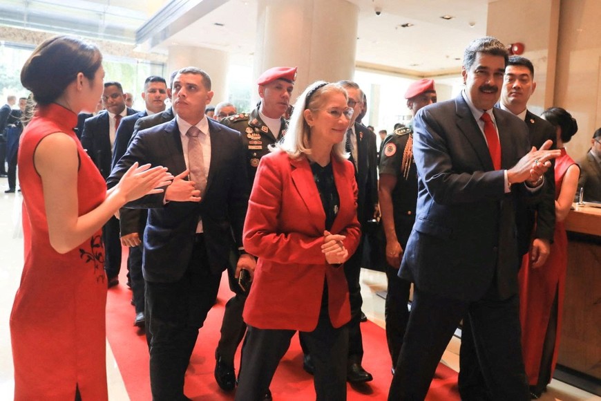 Venezuela's President Nicolas Maduro reacts after arriving with his wife Cilia Flores in Shenzen, China, in this undated Handout photo made available on September 8, 2023. Miraflores Palace/Handout via REUTERS ATTENTION EDITORS - THIS IMAGE HAS BEEN SUPPLIED BY A THIRD PARTY.