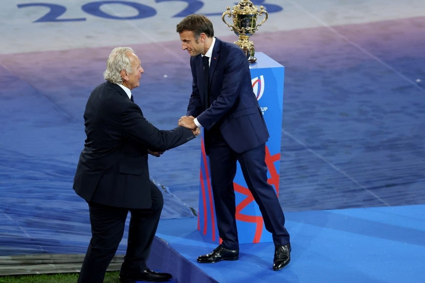 Rugby Union - Rugby World Cup 2023 - Pool A - France v New Zealand - Stade de France, Saint-Denis, France - September 8, 2023
Chairperson of World Rugby, Bill Beaumont shakes hands with French President Emmanuel Macron as they speak ahead of the match REUTERS/Stephanie Lecocq