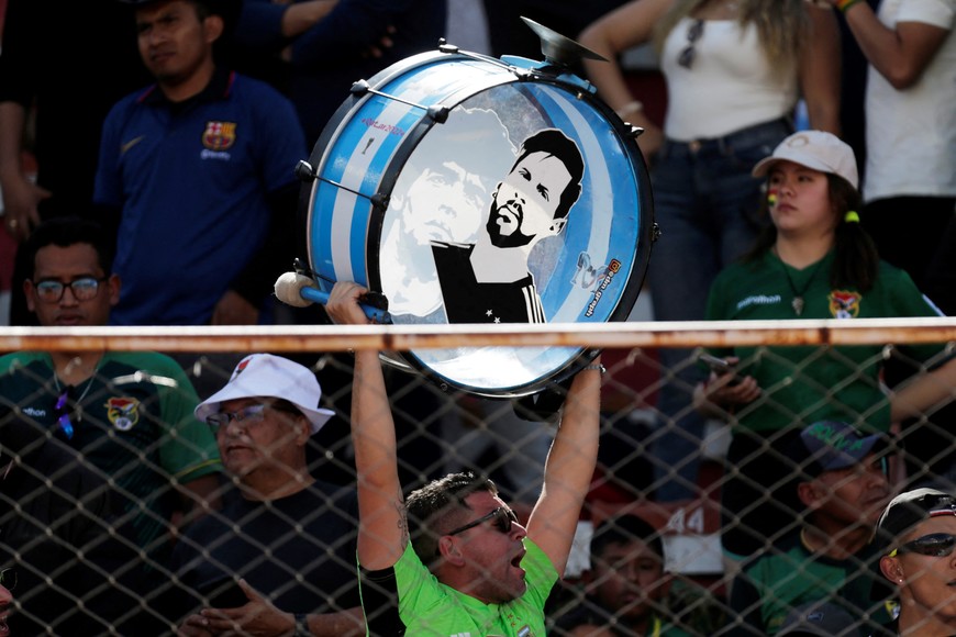 Soccer Football - World Cup - South American Qualifiers - Bolivia v Argentina - Estadio Hernando Siles, La Paz, Bolivia - September 12, 2023
An Argentina fan holds a drum aloft with an image of Lionel Messi on it inside the stadium before the match REUTERS/Manuel Claure