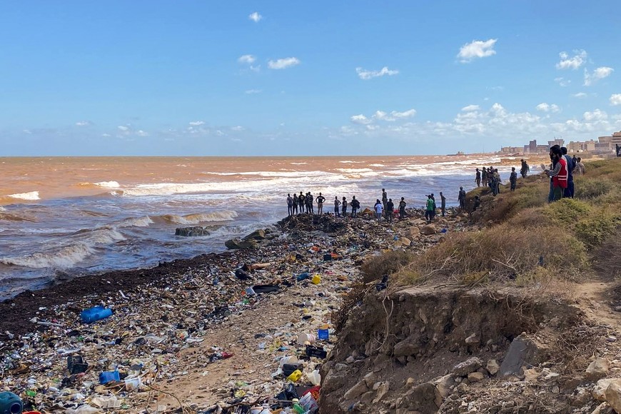 Members of the rescue teams and Libyan Red Crescent search for dead bodies in the sea, after a powerful storm and heavy rainfall hit Libya, in Derna, Libya September 13, 2023. REUTERS/Esam Omran Al-Fetori