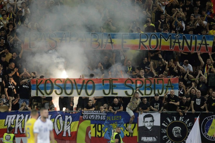 Soccer Football - Euro 2024 Qualifier - Group I - Romania v Kosovo - National Arena, Bucharest, Romania - September 12, 2023
Romania fans inside the stadium hold up banners which subsequently suspends play Inquam Photos via REUTERS/George Calin ROMANIA OUT. NO COMMERCIAL OR EDITORIAL SALES IN ROMANIA. THIS IMAGE HAS BEEN SUPPLIED BY A THIRD PARTY.