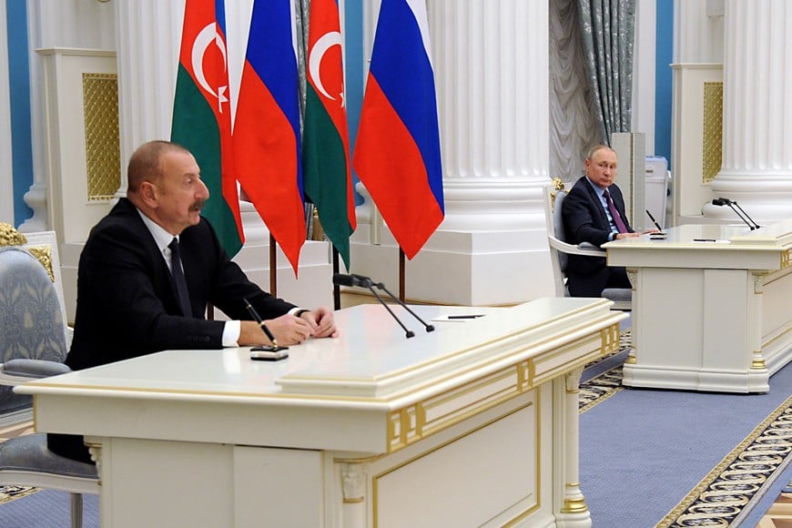 Russia's President Vladimir Putin and Azerbaijan's President Ilham Aliyev attend a joint news conference at the Kremlin in Moscow, Russia, February 22, 2022. Sputnik/Mikhail Klimentyev/Kremlin via REUTERS ATTENTION EDITORS - THIS IMAGE WAS PROVIDED BY A THIRD PARTY.