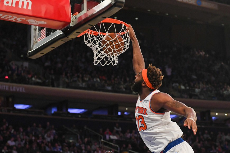 Oct 24, 2021; New York, New York, USA;  New York Knicks center Mitchell Robinson (23) dunks the ball against the Orlando Magic during the second quarter at Madison Square Garden. Mandatory Credit: Dennis Schneidler-USA TODAY Sports