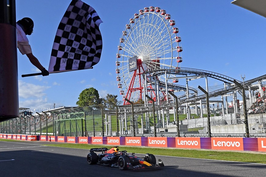 Formula One F1 - Japanese Grand Prix - Suzuka Circuit, Suzuka, Japan - September 24, 2023
Red Bull's Max Verstappen passes the chequered flag to win the Japanese Grand Prix
Toshifumi Kitamura/Pool via REUTERS