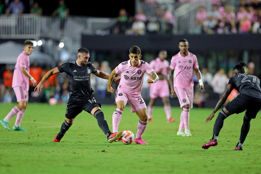 Sep 27, 2023; Fort Lauderdale, FL, USA; Inter Miami CF forward Nicolas Stefanelli (22) battles for the ball against Houston Dynamo midfielder Hector Herrera (16) during the second half at DRV PNK Stadium. Mandatory Credit: Nathan Ray Seebeck-USA TODAY Sports