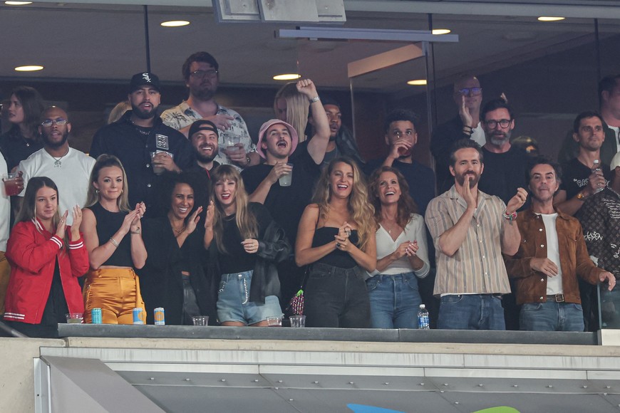Oct 1, 2023; East Rutherford, New Jersey, USA; Taylor Swift, actor Ryan Reynolds, actor Hugh Jackman and friends celebrates after a Kansas City Chiefs touch down during the first half at MetLife Stadium. Mandatory Credit: Vincent Carchietta-USA TODAY Sports