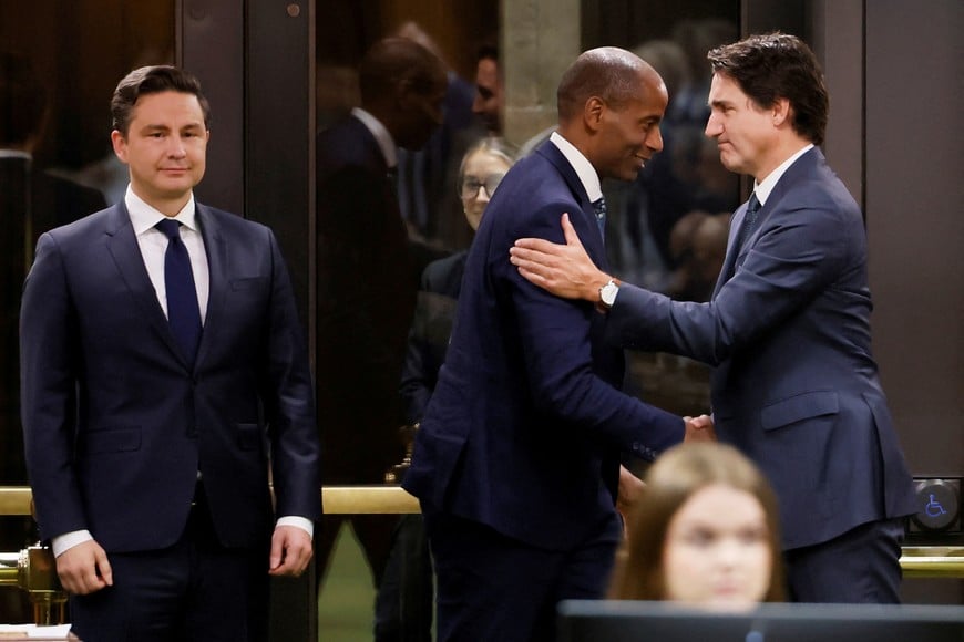 Newly elected Speaker Greg Fergus is congratulated by Canada's Prime Minister Justin Trudeau in the House of Commons on Parliament Hill in Ottawa, Ontario, Canada October 3, 2023. REUTERS/Blair Gable