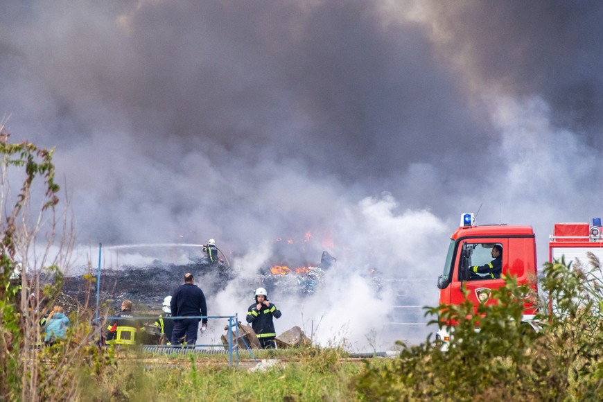 Firefighters put out the fire at Drava International factory near Osijek, Croatia, October 4, 2023. REUTERS/Antonio Bronic