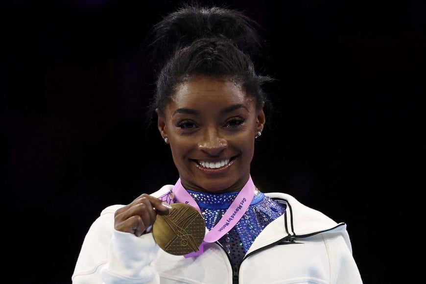 Gymnastics - 2023 World Artistic Gymnastics Championships - Sportpaleis, Antwerp, Belgium - October 6, 2023
Gold medalist Simone Biles of the U.S. celebrates on the podium after winning the women's individual all-around final REUTERS/Yves Herman     TPX IMAGES OF THE DAY