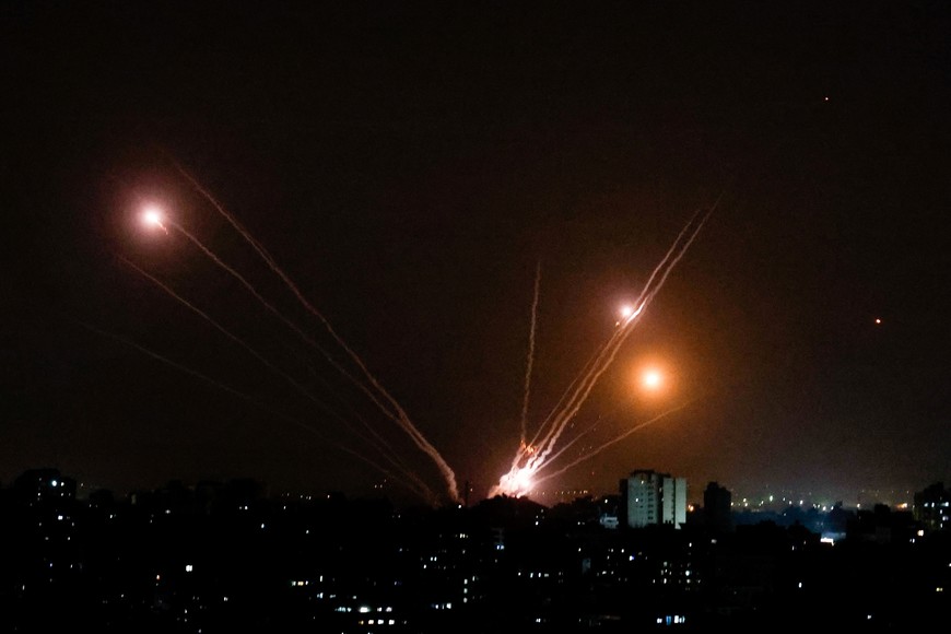 Rockets are fired from Gaza towards Israel, in Gaza October 9, 2023. REUTERS/Mohammed Salem