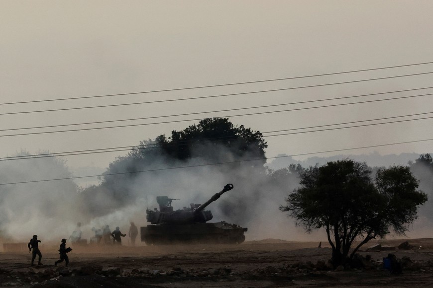 An Israeli tank is positioned near Israel's border with Lebanon, northern Israel, October 9, 2023. REUTERS/Ammar Awad