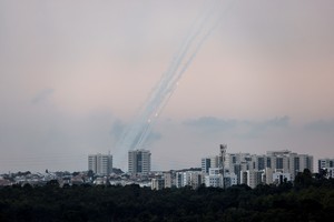 Rockets are launched from the Gaza Strip towards Israel, as seen from the Israeli side of the border with Gaza, in southern Israel, October 9, 2023. REUTERS/Amir Cohen