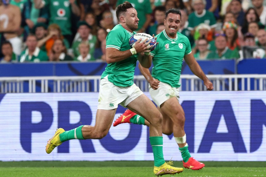 Rugby Union - Rugby World Cup 2023 - Pool B - Ireland v Scotland - Stade de France, Saint-Denis, France - October 7, 2023
Ireland's Hugo Keenan scores their second try REUTERS/Stephanie Lecocq