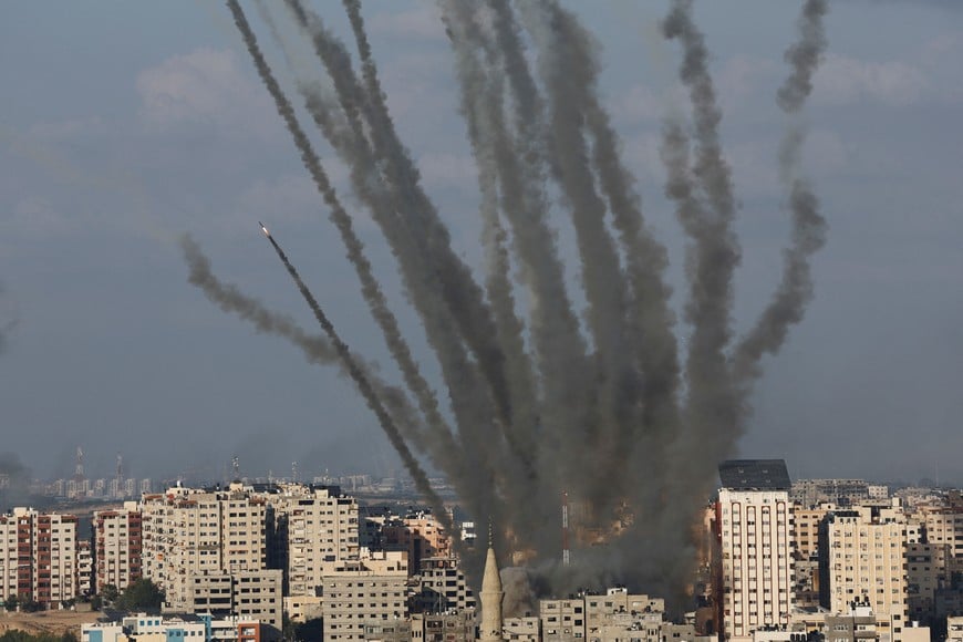 Rockets are fired from Gaza towards Israel, in Gaza, October 10, 2023. REUTERS/Mohammed Salem