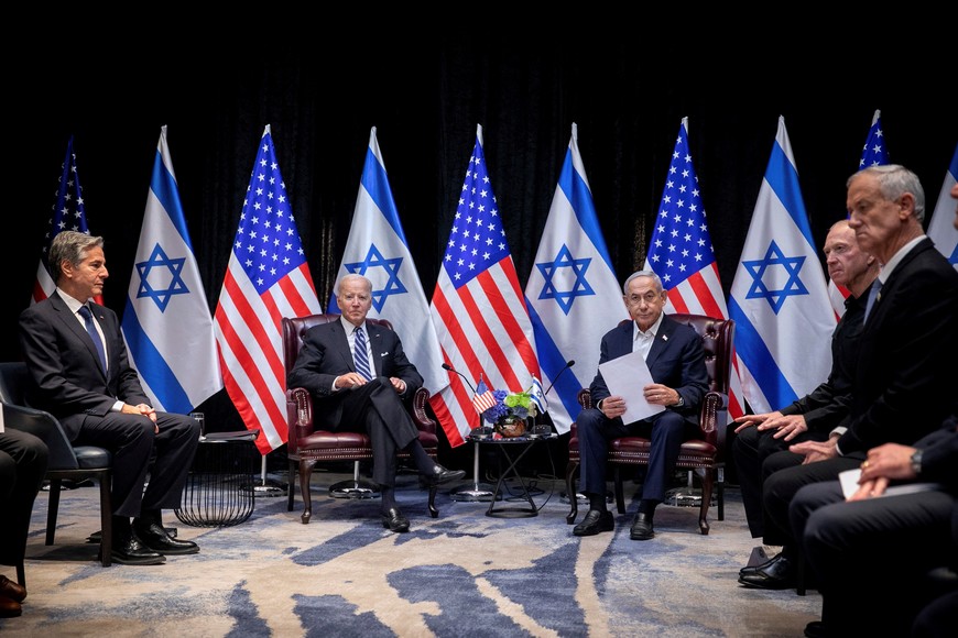 U.S. President Joe Biden, centre left, pauses during a meeting with Israeli Prime Minister Benjamin Netanyahu, centre right, to discuss the ongoing conflict between Israel and Hamas, in Tel Aviv, Israel, Wednesday, Oct. 18, 2023. Miriam Alster/Pool via REUTERS