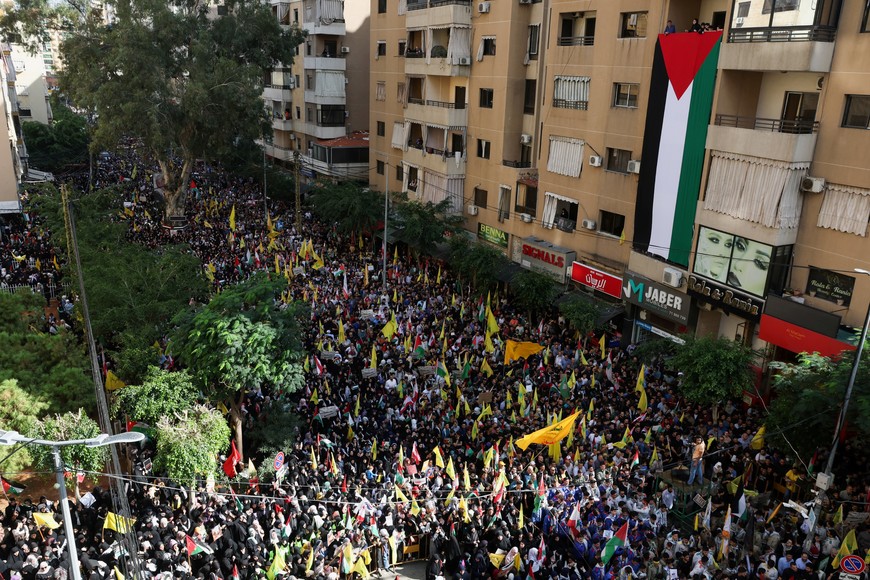 Hezbollah supporters take part in a protest, after hundreds of Palestinians were killed in a blast at Al-Ahli hospital in Gaza that Israeli and Palestinian officials blamed on each other, in Beirut's southern suburbs, Lebanon October 18, 2023. REUTERS/Mohamed Azakir