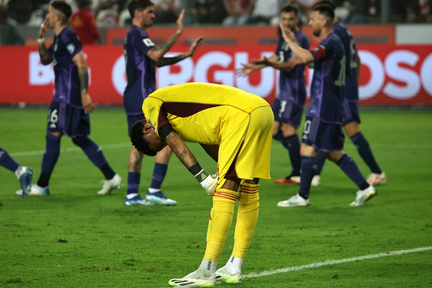 Soccer Football - World Cup - South American Qualifiers - Peru v Argentina - Estadio Nacional, Lima, Peru - October 17, 2023
Peru's Pedro Gallese reacts after Argentina's Lionel Messi scored their second goal REUTERS/Sebastian Castaneda