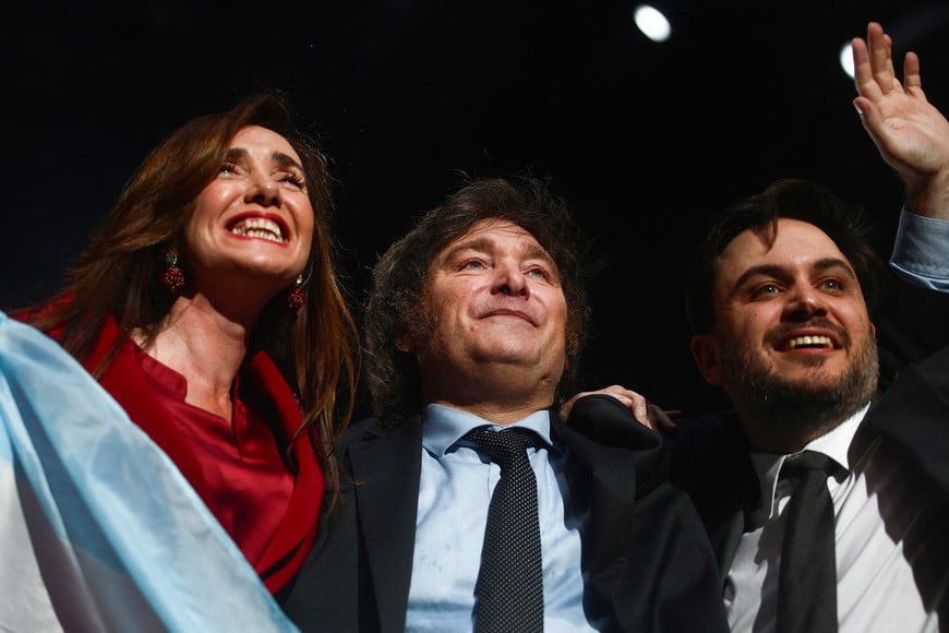 Argentine presidential candidate Javier Milei, vice presidential candidate Victoria Villarruel and candidate for mayor of the city of Buenos Aires, Ramiro Marra of La Libertad Avanza party react during the closing event of Milei's electoral campaign ahead of the presidential election, in Buenos Aires, Argentina, October 18, 2023. REUTERS/Matias Baglietto