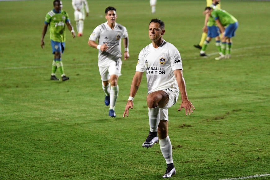 Nov 4, 2020; Carson, California, USA; LA Galaxy forward Javier Hernández (14) celebrates his goal against the Seattle Sounders FC during the second half at Dignity Health Sports Park. Mandatory Credit: Kelvin Kuo-USA TODAY Sports