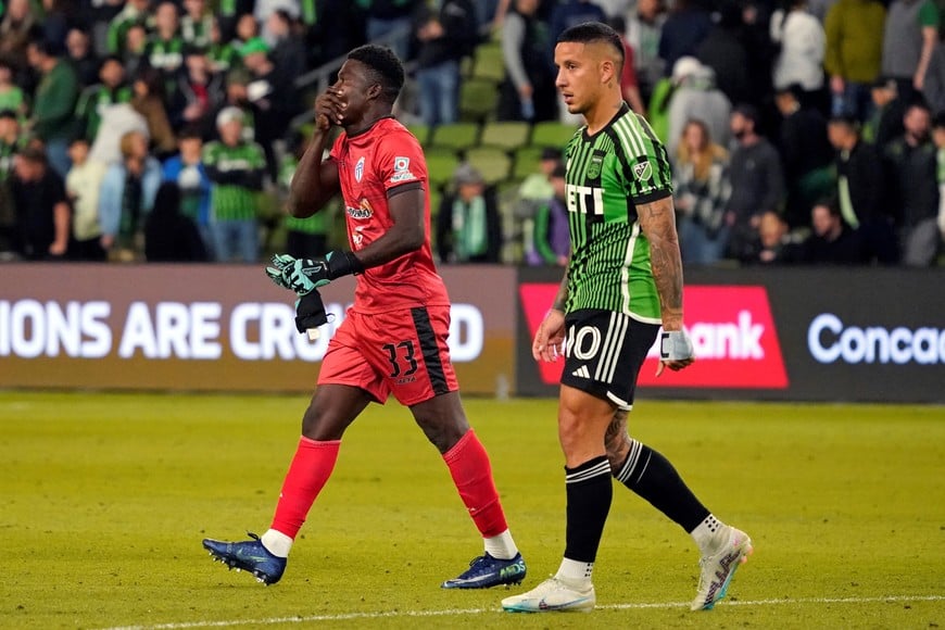 Mar 14, 2023; Austin, TX, USA; Violette AC goalkeeper Paul Décius(33) reacts while walking past Austin FC forward Sebastián Driussi (10) after Violette AC advances after the match at Q2 Stadium. Mandatory Credit: Scott Wachter-USA TODAY Sports