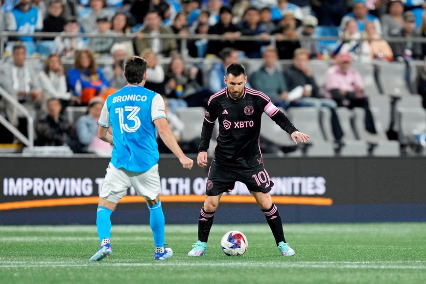 Oct 21, 2023; Charlotte, North Carolina, USA; Inter Miami CF forward Lionel Messi (10) controls the ball against Charlotte FC midfielder Brandt Bronico (13) during the second half at Bank of America Stadium. Mandatory Credit: Jim Dedmon-USA TODAY Sports