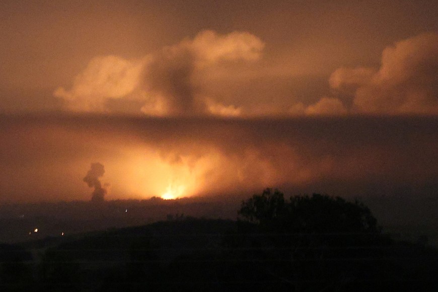 A view of explosion in Gaza, seen from Sderot in southern Israel, October 27, 2023. REUTERS/Violeta Santos Moura