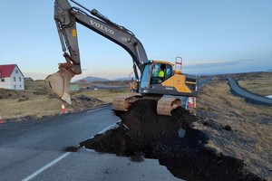 Streetworks continue, after cracks emerged on a road due to volcanic activity near Grindavik, Iceland obtained by Reuters on November 14, 2023. Road Administration of Iceland via Facebook/ Handout via REUTERS THIS IMAGE HAS BEEN SUPPLIED BY A THIRD PARTY. NO RESALES. NO ARCHIVES. MANDATORY CREDIT     TPX IMAGES OF THE DAY