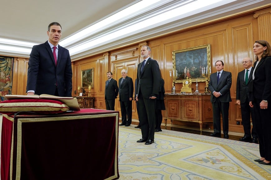 Spain's Prime Minister Pedro Sanchez takes the oath of office during a ceremony at Zarzuela Palace in Madrid, Spain November 17, 2023. Andres Ballesteros/Pool via REUTERS