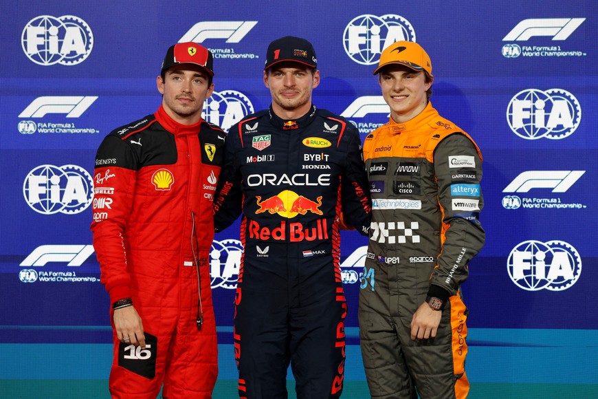 Formula One F1 - Abu Dhabi Grand Prix - Yas Marina Circuit, Abu Dhabi, United Arab Emirates - November 25, 2023
Red Bull's Max Verstappen celebrates after qualifying in pole position with Ferrari's Charles Leclerc and McLaren's Oscar Piastri REUTERS/Hamad I Mohammed