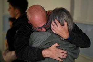 Sharon Avigdori, who was abducted by Hamas gunmen during the October 7 attack on Israel, hugs her husband Chen shortly after being released on November 25, at an unknown location, in this handout picture released on November 26, 2023. Israeli Government Press Office/Haim Zach/Handout via REUTERS THIS IMAGE HAS BEEN SUPPLIED BY A THIRD PARTY. MANDATORY CREDIT