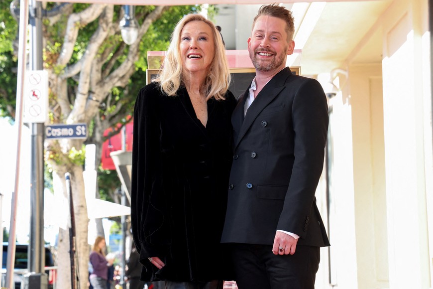 Actors Catherine O’Hara and Macaulay Culkin pose during the unveiling ceremony of Culkin's star on the Hollywood Walk of Fame, in Los Angeles, California, U.S. December 1, 2023. REUTERS/Mario Anzuoni