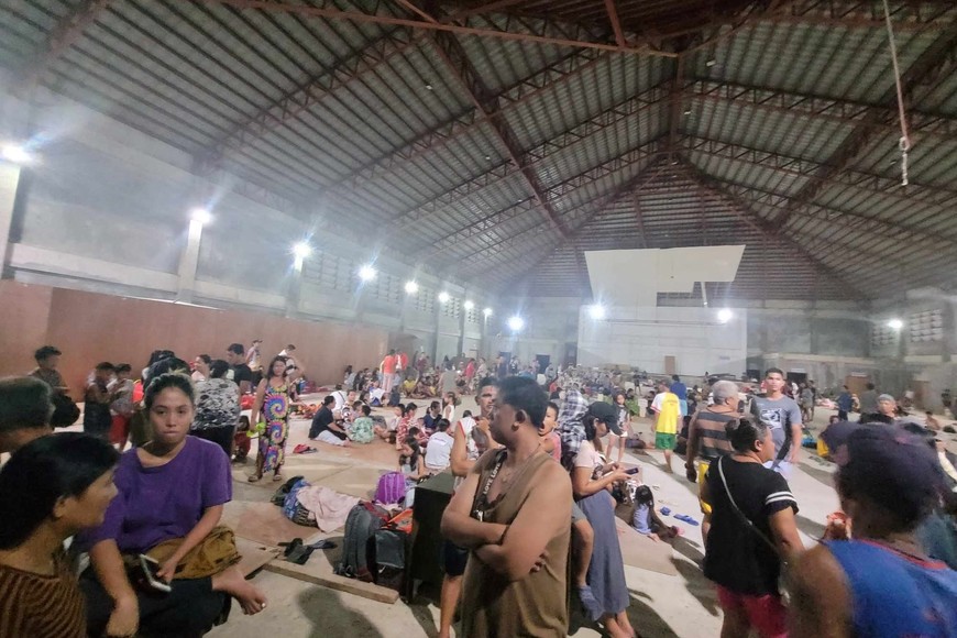 People gather at an evacuation center, in the aftermath of an earthquake, in Hinatuan, Surigao del Sur, Philippines December 2, 2023. Hinatuan LGU/Handout via REUTERS    THIS IMAGE HAS BEEN SUPPLIED BY A THIRD PARTY. NO RESALES. NO ARCHIVES. MANDATORY CREDIT.
