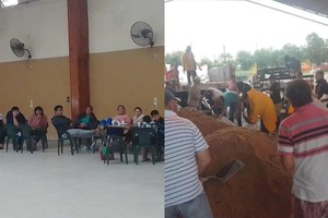 Vecinos evacuados están en el Club de Leones, mientras personal municipal trabaja a destajo en el corralón llenando bolsas con arena. Crédito: Juan M. Peratitis.