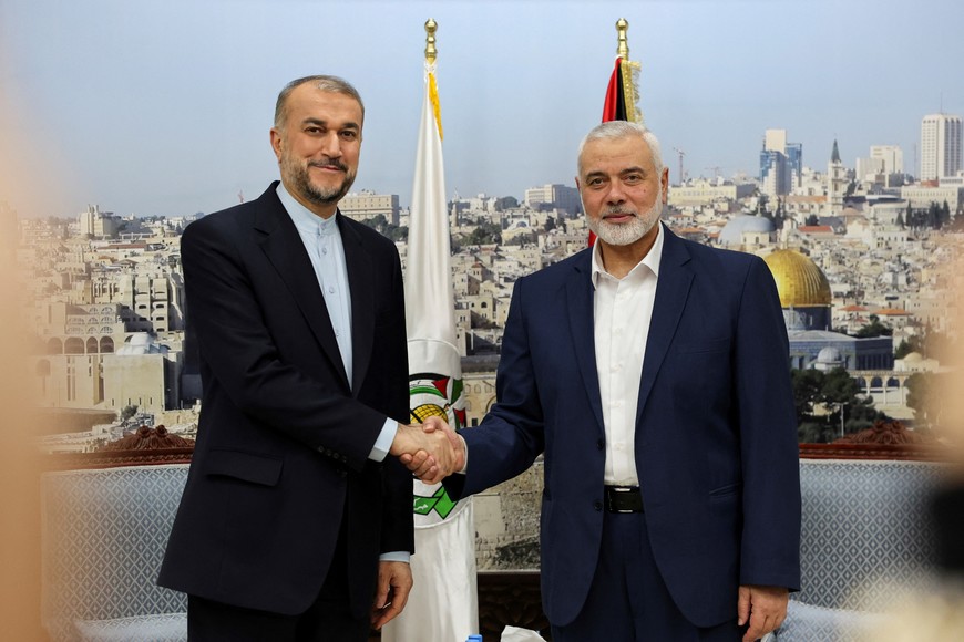Iran's Foreign Minister Hossein Amir Abdollahian meets with Palestinian group Hamas' top leader, Ismail Haniyeh in Doha, Qatar December 20, 2023. Iran's Foreign Ministry/WANA (West Asia News Agency)/Handout via REUTERS ATTENTION EDITORS - THIS IMAGE HAS BEEN SUPPLIED BY A THIRD PARTY.