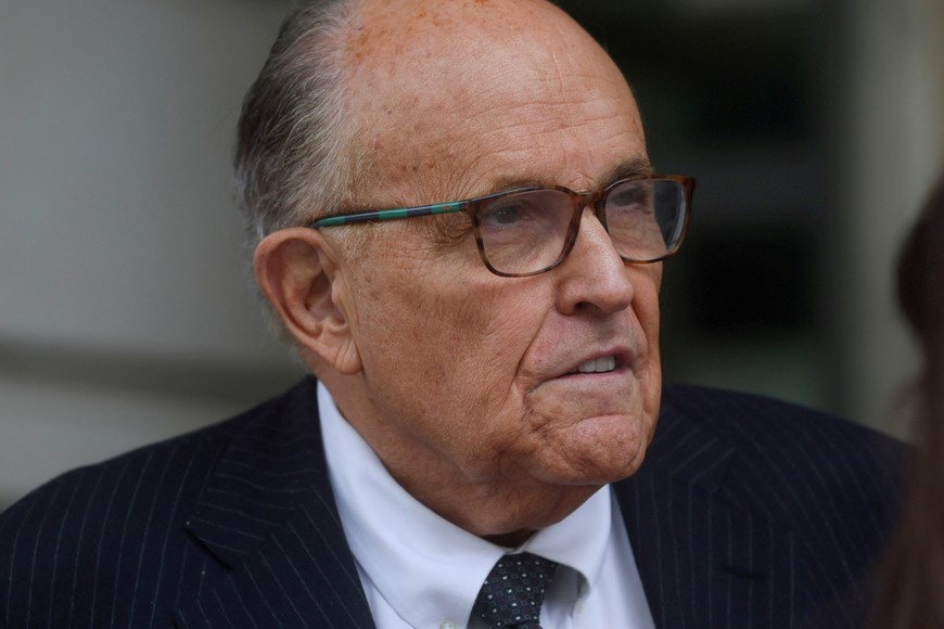 FILE PHOTO: Former New York City Mayor Rudy Giuliani, an attorney for former U.S. President Donald Trump during challenges to the 2020 election results, exits U.S. District Court after attending a hearing in a defamation suit related to the 2020 election results that has been brought against Giuliani by two Georgia election workers, at the federal courthouse in Washington, U.S., May 19, 2023. REUTERS/Leah Millis/File Photo