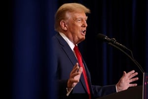 FILE PHOTO: Republican presidential candidate and former U.S. President Donald Trump attends a campaign event in Waterloo, Iowa, U.S. December 19, 2023. REUTERS/Scott Morgan/File Photo