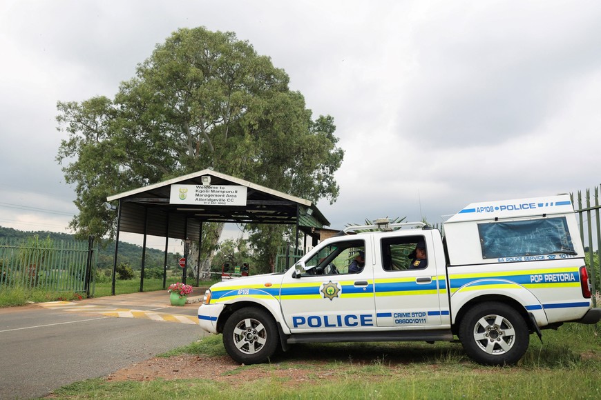 A police vehicle is parked at the entrance of the Atteridgeville Correctional Centre, where South African athlete Oscar Pistorius, who was convicted of killing his girlfriend Reeva Steenkamp in 2013, was released on parole, in Pretoria, South Africa January 5, 2024. REUTERS/Alet Pretorius