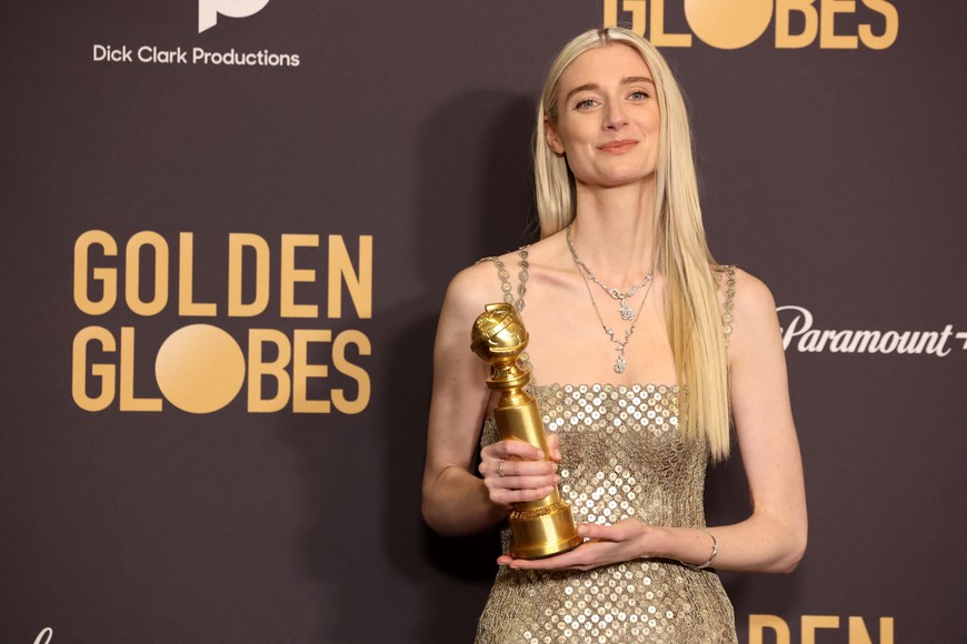 Elizabeth Debicki poses with the award for Best Performance by a Female Actor in a Supporting Role on Television for "The Crown" at the 81st Annual Golden Globe Awards in Beverly Hills, California, U.S., January 7, 2024. REUTERS/Mario Anzuoni