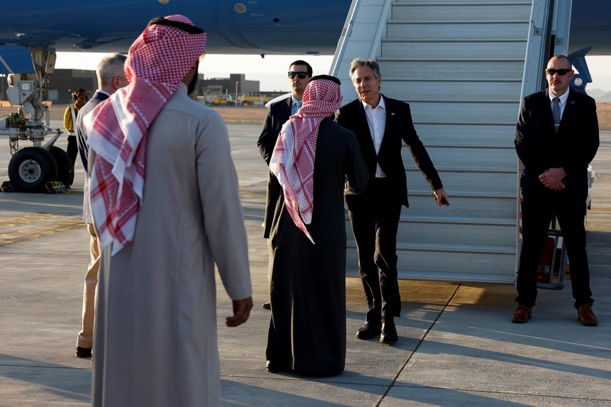 U.S. Secretary of State Antony Blinken is greeted by Saudi Arabia's Foreign Minister Prince Faisal bin Farhan Al-Saud as he arrives, during his week-long trip aimed at calming tensions across the Middle East, in Al Ula, Saudi Arabia, January 8, 2024. REUTERS/Evelyn Hockstein/Pool