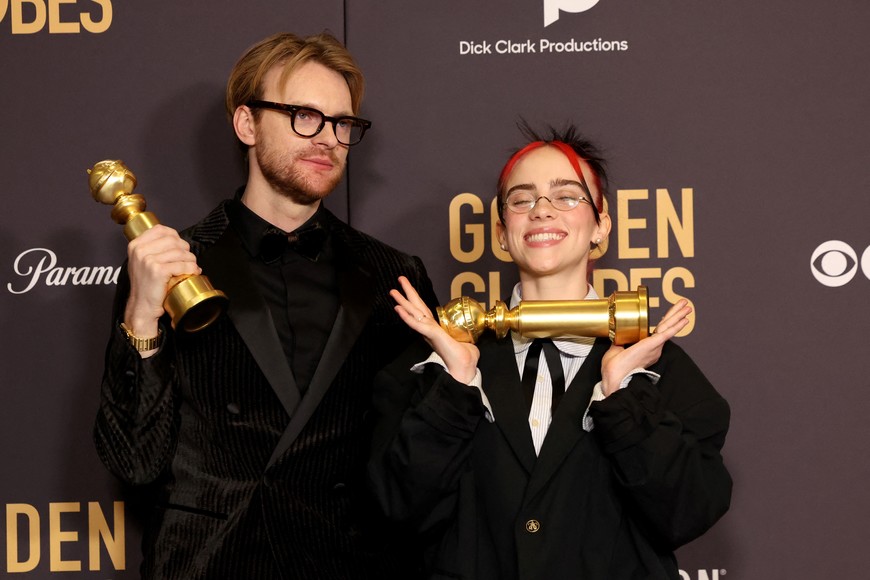 Billie Eilish and Finneas O'Connell, winners of Best Original Song - Motion Picture for "What Was I Made For?" from "Barbie", pose at the 81st Annual Golden Globe Awards in Beverly Hills, California, U.S., January 7, 2024. REUTERS/Mario Anzuoni