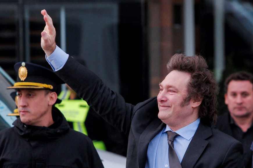 Argentina's President Javier Milei waves to supporters outside the hotel where he will stay before traveling to Antartica, in Rio Gallegos, Santa Cruz, Argentina January 5, 2024. REUTERS/Horacio Cordoba NO RESALES. NO ARCHIVES