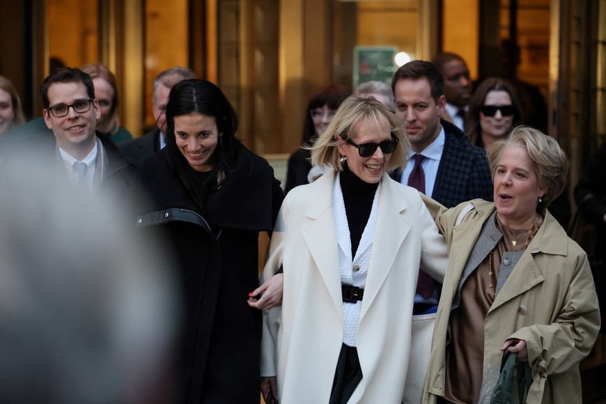 E. Jean Carroll and her attorneys Shawn Crowley and Roberta Kaplan walk outside the Manhattan Federal Court, after the verdict in the second civil trial was reached after she accused former U.S. President Donald Trump of raping her decades ago, in New York City, U.S., January 26, 2024. REUTERS/Brendan Mcdermid