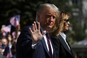 U.S. President Donald Trump waves to reporters as he departs with first lady Melania Trump for campaign travel to participate in his first presidential debate with Democratic presidential nominee Joe Biden in Cleveland, Ohio from the South Lawn at the White House in Washington, U.S., September 29, 2020. President Trump recently announced that he and the first lady have both tested positive for the coronavirus disease (COVID-19). Picture taken September 29, 2020. REUTERS/Leah Millis