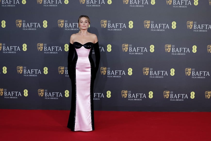 Margot Robbie poses as she arrives at the 2024 British Academy of Film and Television Awards (BAFTA) at the Royal Festival Hall in the Southbank Centre, London, Britain, February 18, 2024. REUTERS/Isabel Infantes