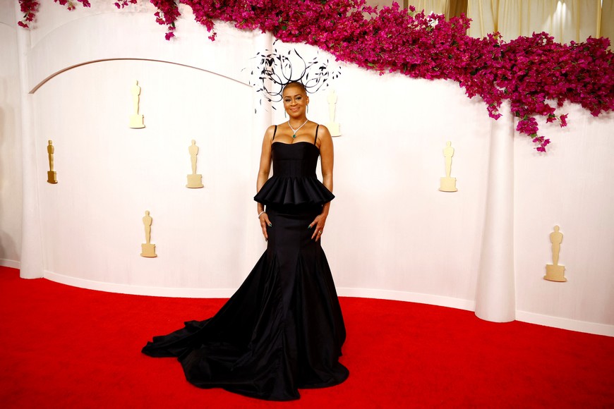 Jacqueline Stewart poses on the red carpet during the Oscars arrivals at the 96th Academy Awards in Hollywood, Los Angeles, California, U.S., March 10, 2024. REUTERS/Sarah Meyssonnier