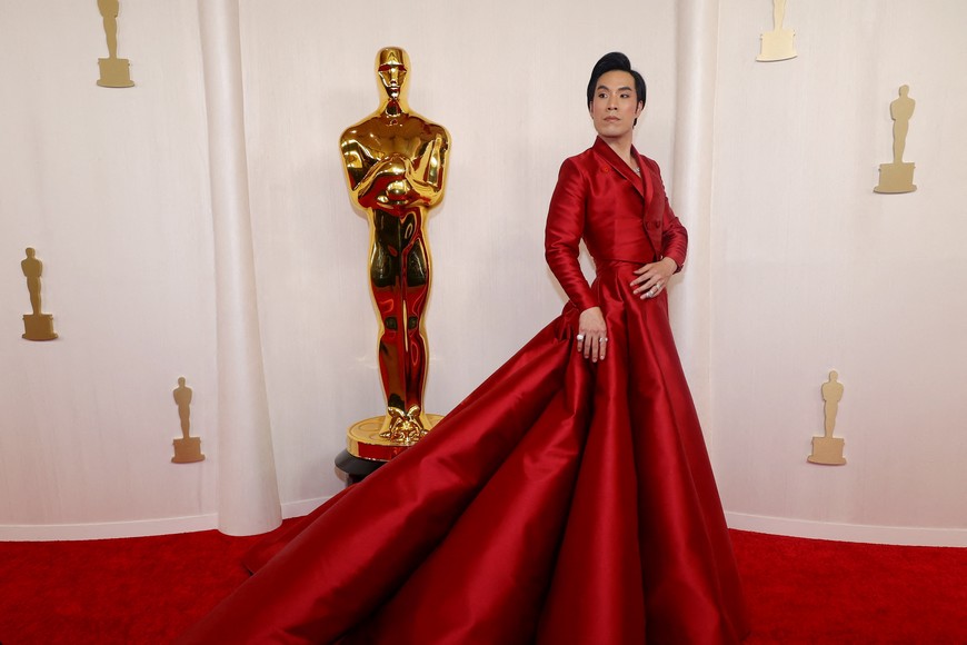 Eugene Lee Yang poses on the red carpet during the Oscars arrivals at the 96th Academy Awards in Hollywood, Los Angeles, California, U.S., March 10, 2024. REUTERS/Aude Guerrucci