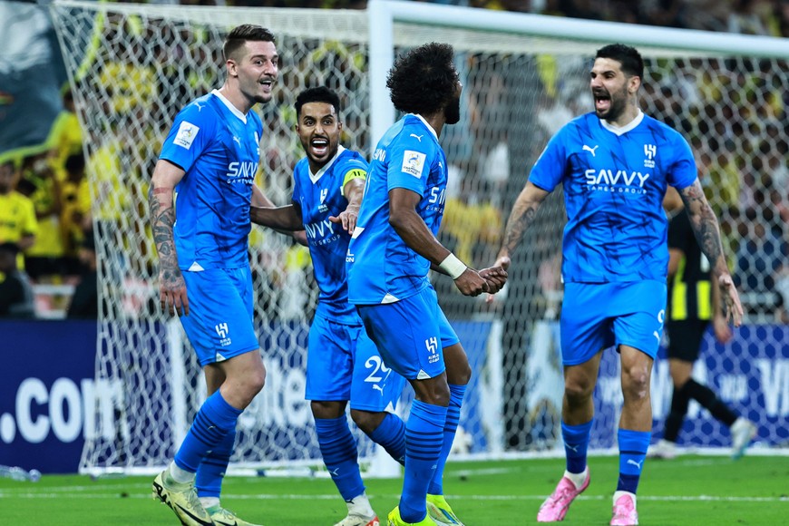 Soccer Football - Asian Champions League - Quarter Final - Second Leg - Al Ittihad v Al Hilal - King Abdullah Sports City, Jeddah, Saudi Arabia - March 12, 2024
Al Hilal's Yasser Al-Shahrani celebrates scoring their first goal with teammates REUTERS/Stringer