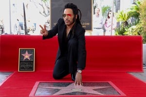 Lenny Kravitz poses during the unveiling ceremony of his star on the Hollywood Walk of Fame, in Los Angeles, California, U.S. March 12, 2024. REUTERS/Mario Anzuoni