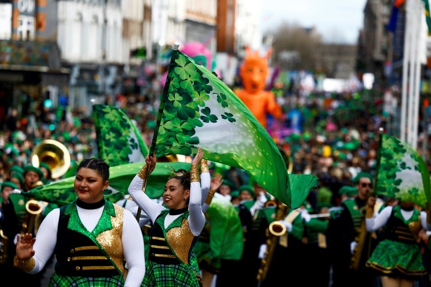 Revellers walk the St. Patrick's Day parade in Dublin, Ireland March 17, 2024. REUTERS/Clodagh Kilcoyne