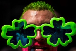 A man attends the annual Saint Patrick's Day Parade on 5th Avenue in Manhattan, New York City, U.S., March 16, 2024.  REUTERS/Eduardo Munoz